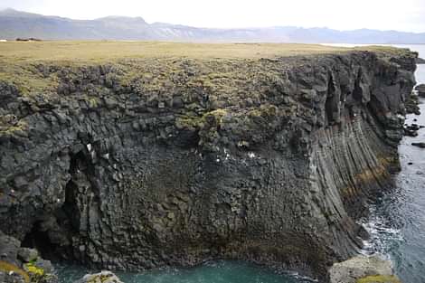 A cliff in Iceland visited during South coast and northern lights tour