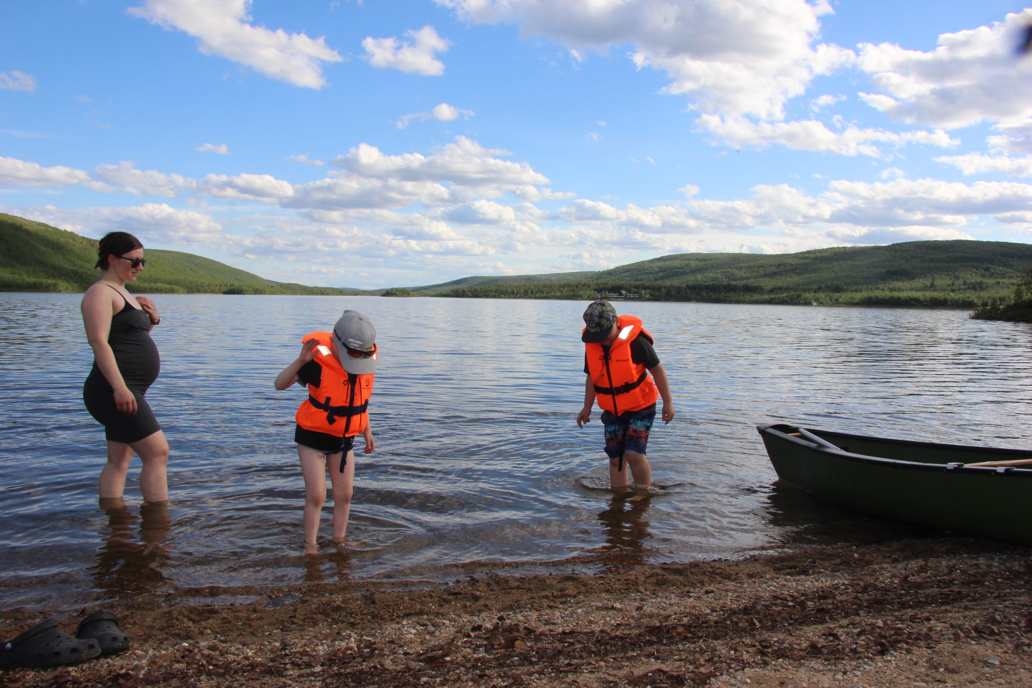 Family canoe trip in Mantojärvi, Utsjoki, Lapland.