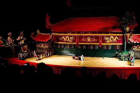 Authentic Vietnamese Dinner and Captivating Water Puppet Show Experience