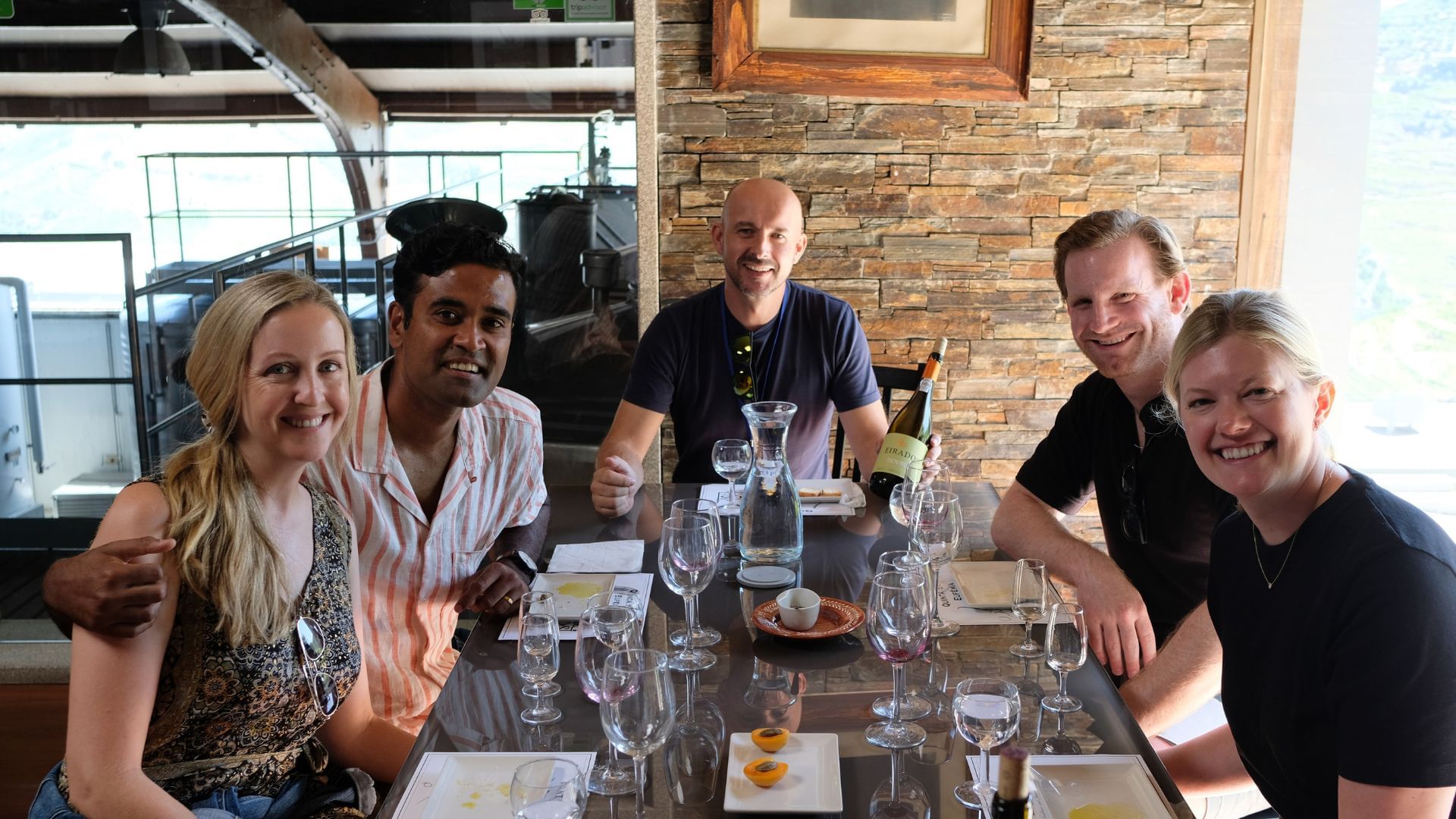 Image of a group having a wine tasting with Douro Wines and Port Wines on Cooltour Oporto's Douro Valley Wine Tour from Porto