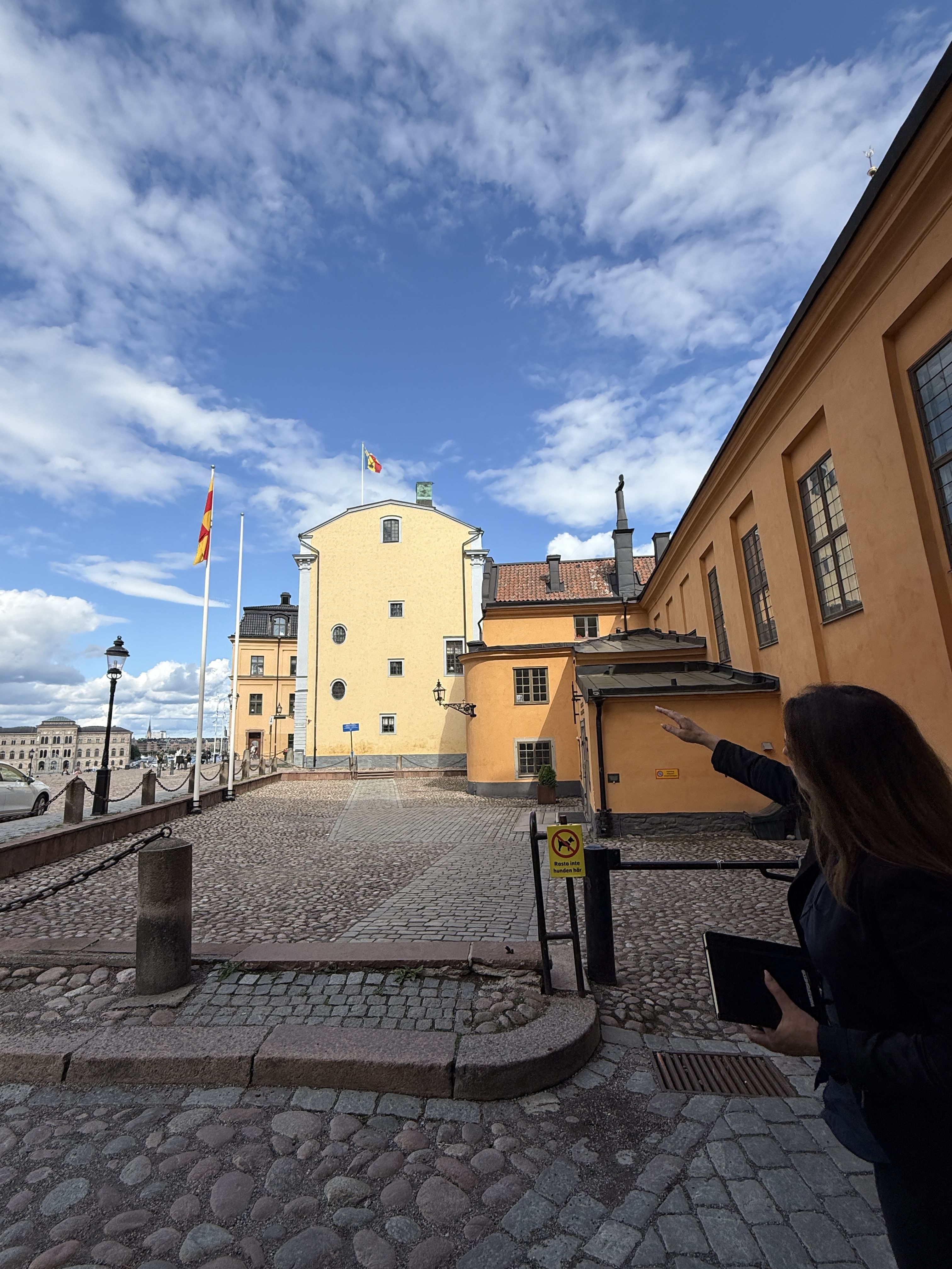 Private guide in Gamla Stan pointing out historic sites