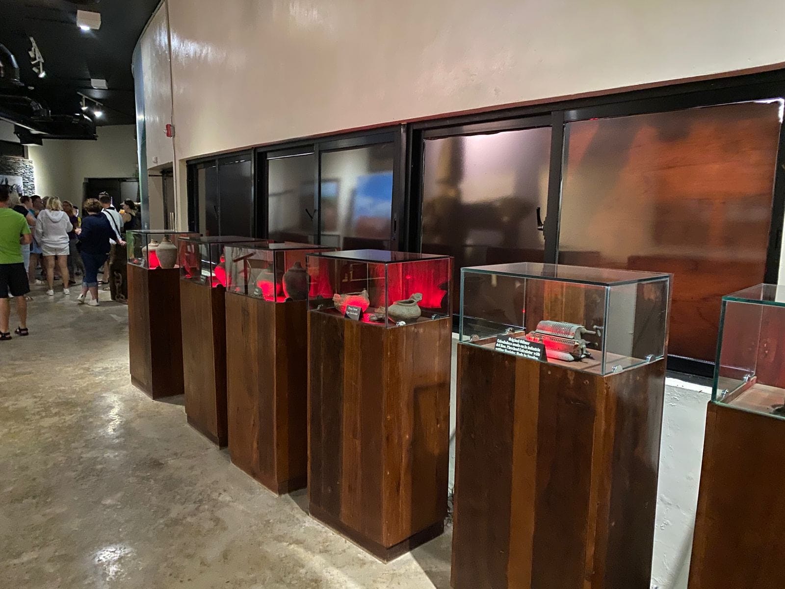 Showcases with historic pieces exhibited during the tour at the Ron Barceló Historic Center.