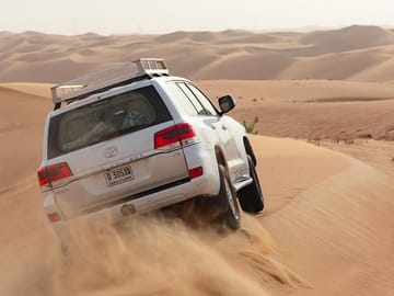 Off-road vehicle takes travelers on a desert ride.