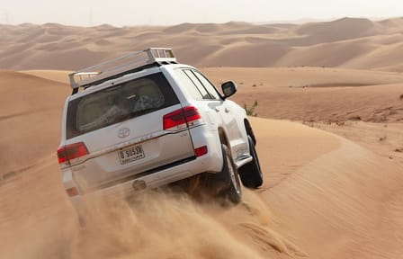Premium Dubai Desert Safari with BBQ Dinner in the Red Dunes