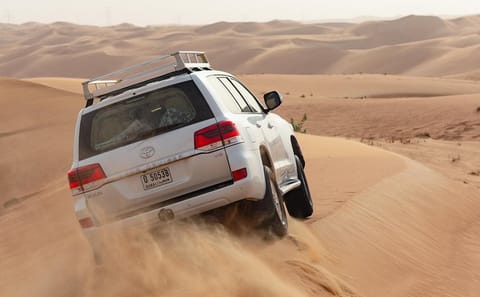 Premium Dubai Desert Safari with ATV Ride and BBQ Dinner
