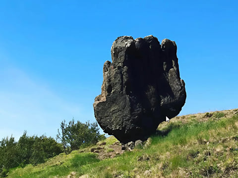A close up of an elf rock
