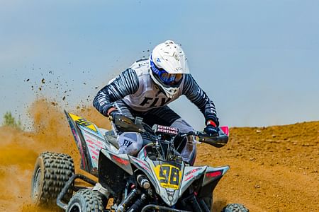 Sunset Desert Safari in Dubai With ATV, Sandboarding & VIP Camp