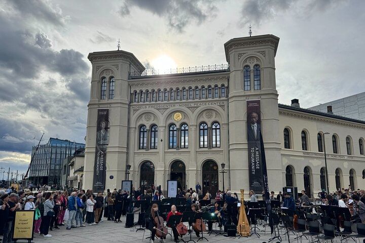 Nobel peace center facade with musicians outside