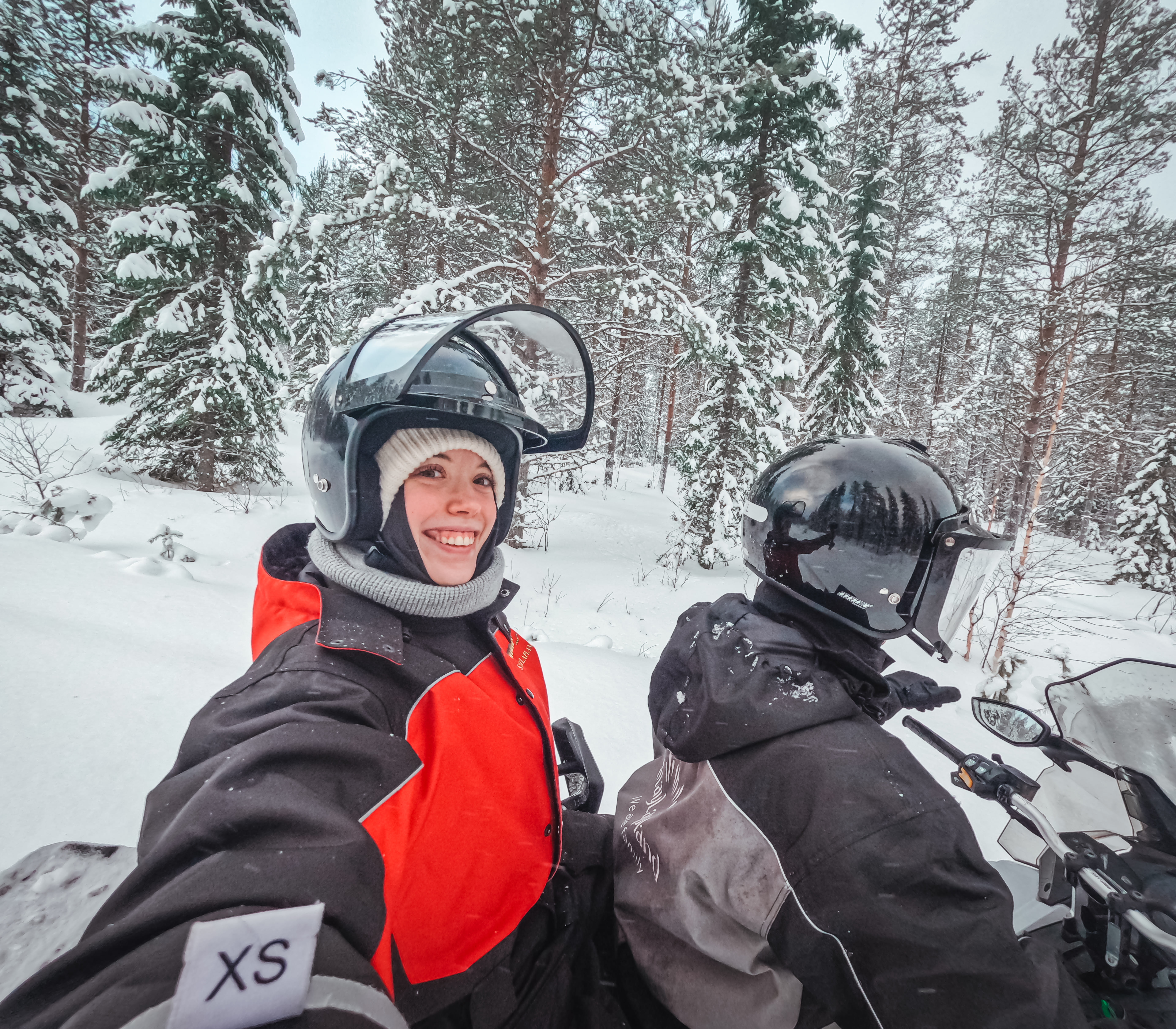A successful ice fishing moment in Rovaniemi during StayLapland’s Ice Fishing with Snowmobiles.