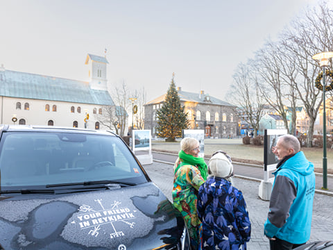 Travellers learning about the history of downtown Reykjavik