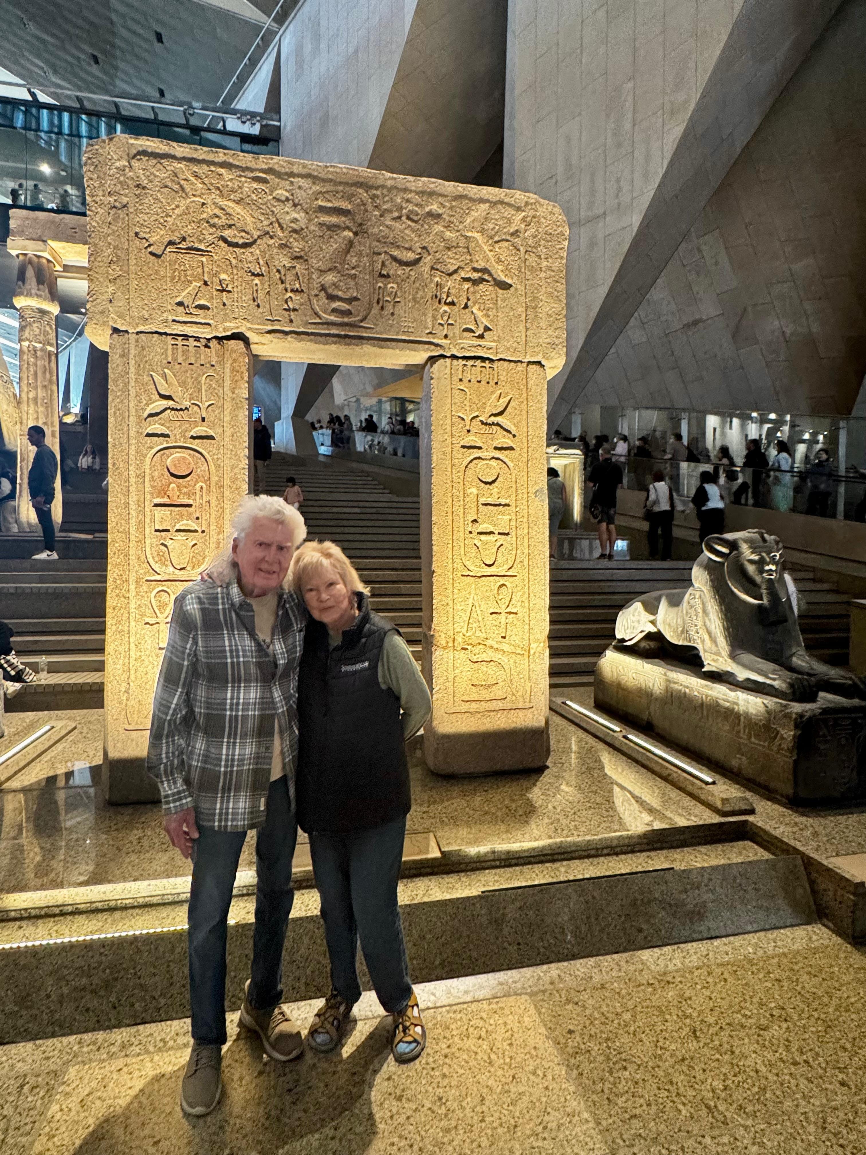 Tourists admiring Tutankhamun’s treasures and ancient archaeological collections inside the Grand Egyptian Museum Cairo.