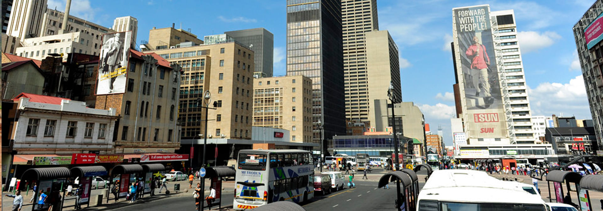 Dynamic skyline and bustling streets of Johannesburg.