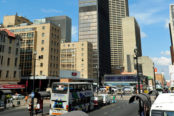 Dynamic skyline and bustling streets of Johannesburg.