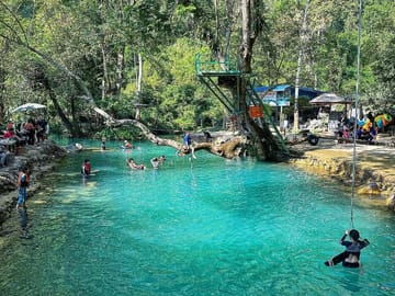 Adventure Tour: Kayak, Zipline, and Explore Caves in Vang Vieng