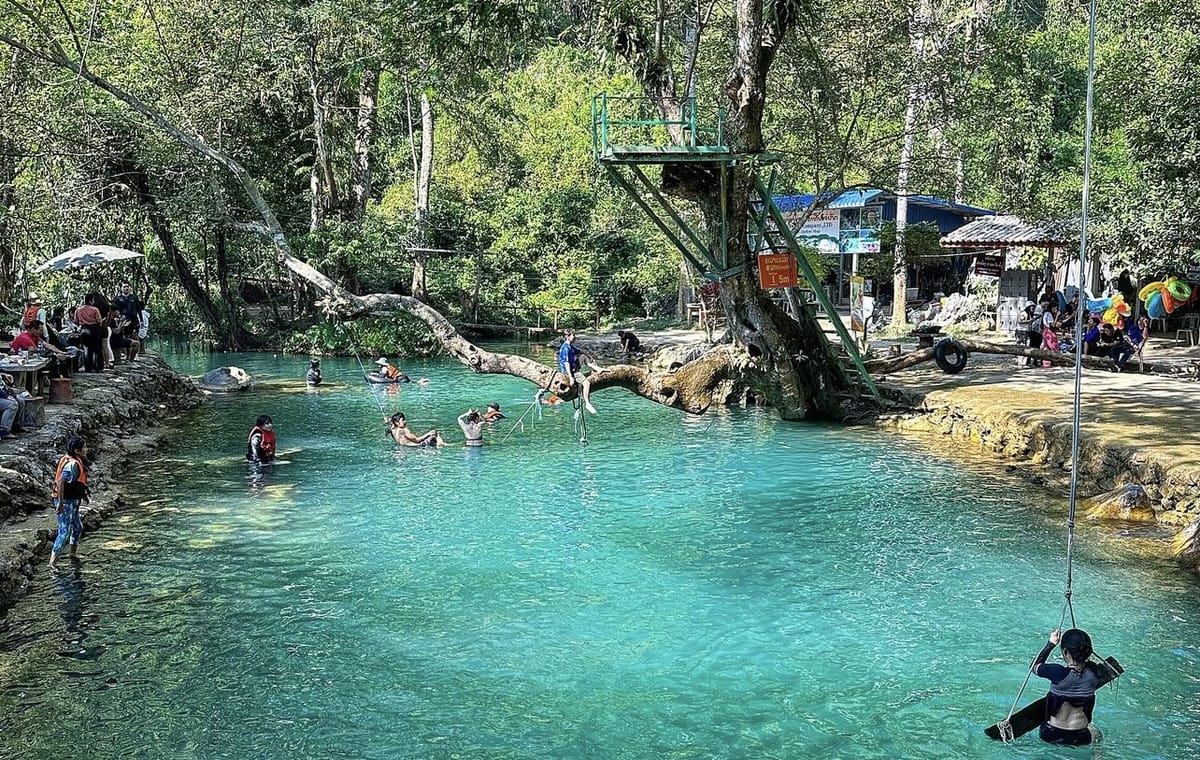 Adventure Tour: Kayak, Zipline, and Explore Caves in Vang Vieng