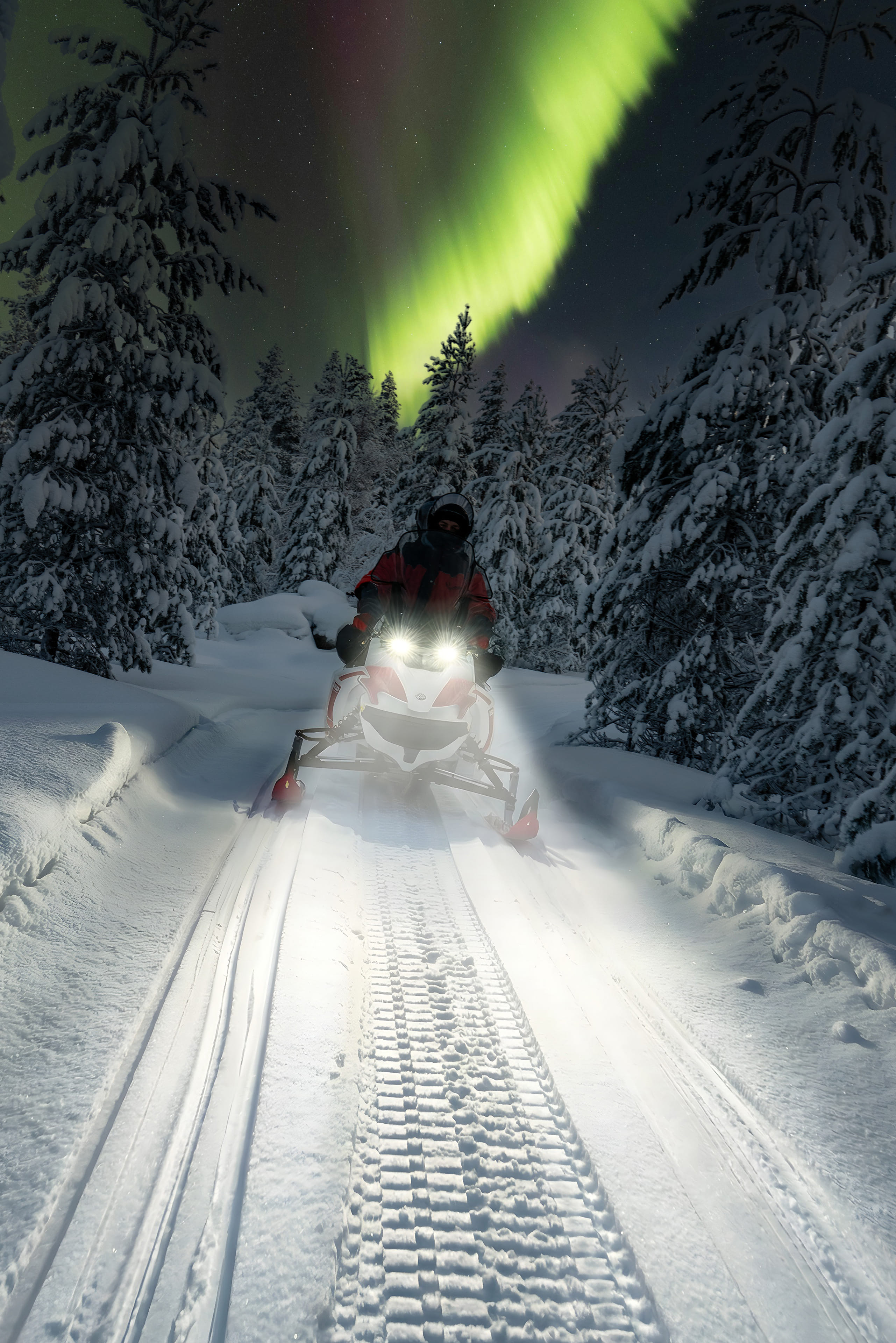 Northern Lights safari on electric snowmobile in Rovaniemi