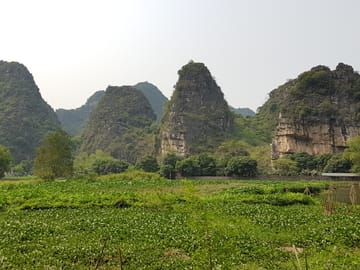 Ninh Binh Day Trip with Trang An and Dinh Pagoda Visit