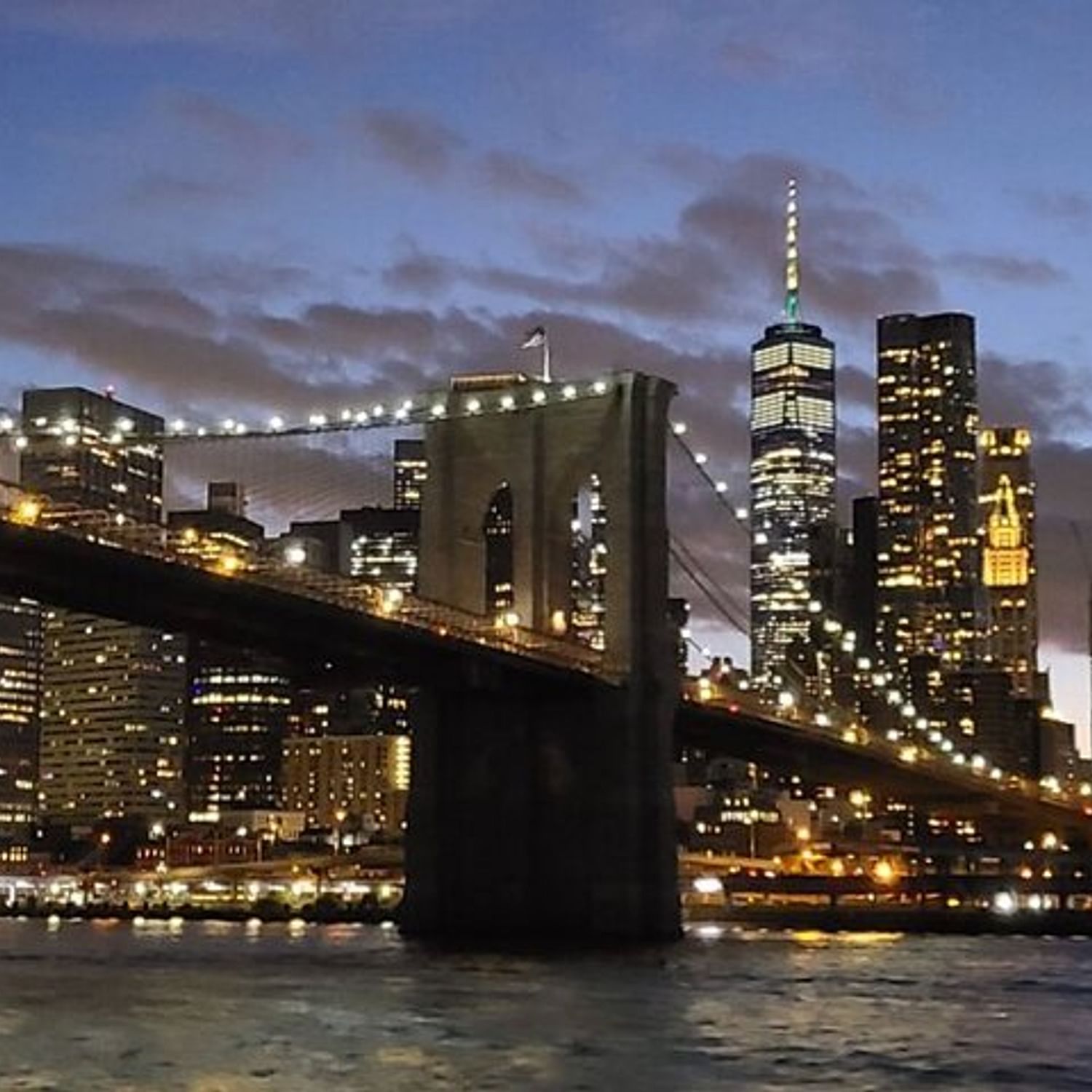 nyc statue of liberty night cruise and skyline