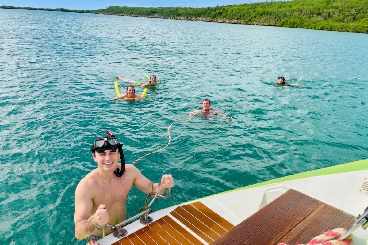 Cruisers enjoying snorkeling through Spanish Waters during a shore excursion by Maxie Sailing in Curacao