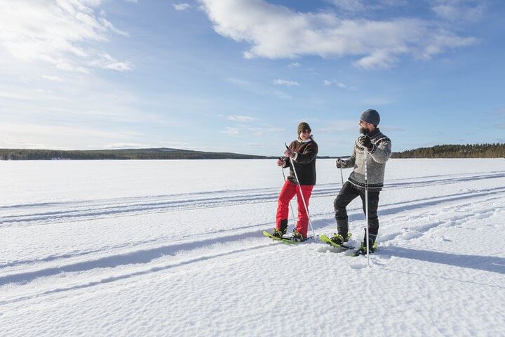 Snowshoeing tour in Rovaniemi with StayLapland, enjoying the Arctic nature.