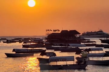 Zanzibar Sunset Dhow Cruise with Snacks and Music from Stone Town