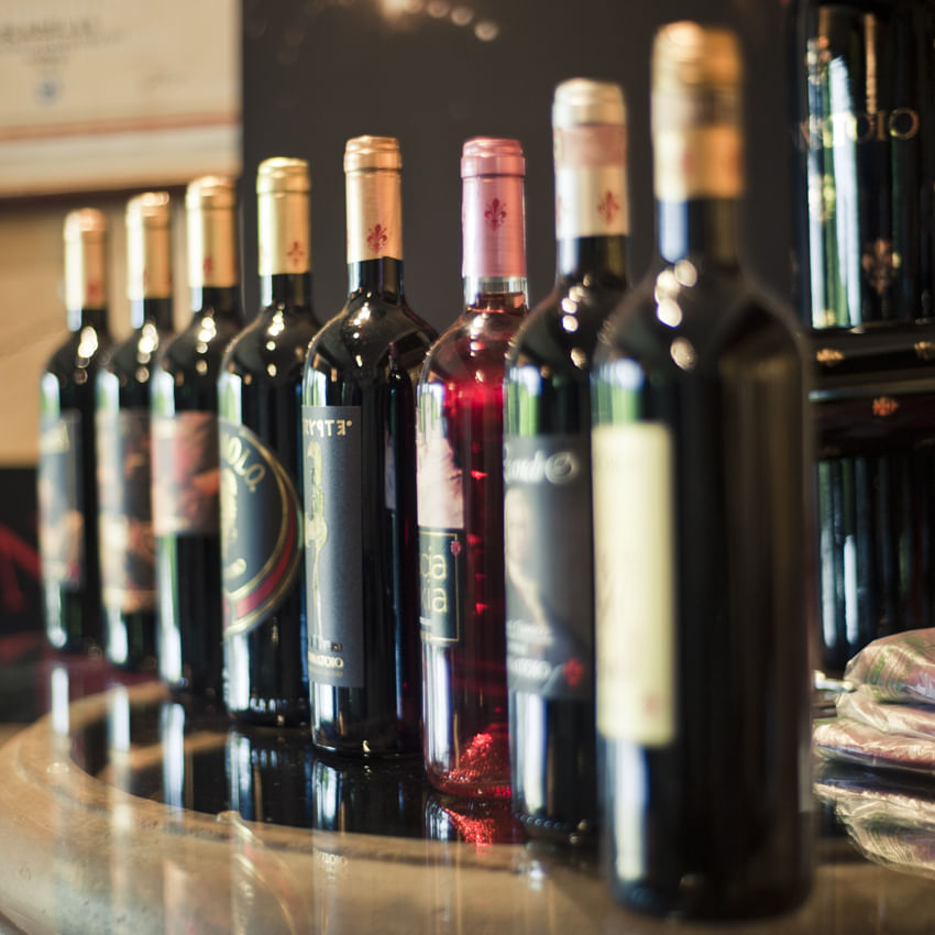 Bottles of red Chianti wine on display