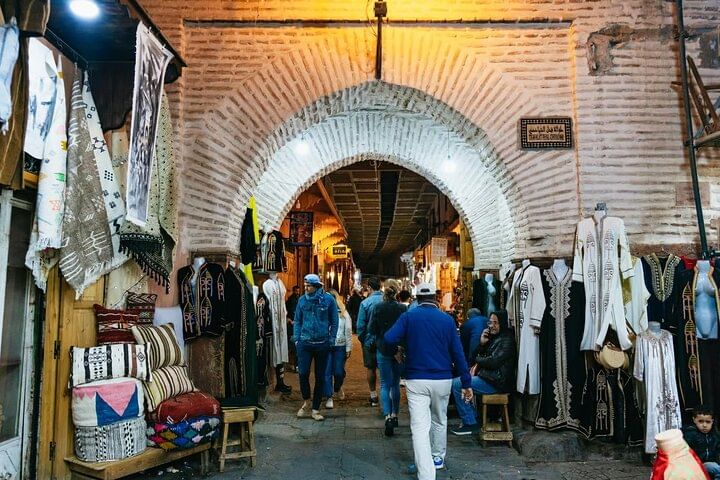 Evening Souk Experience in Marrakech Wander through colorful evening souks filled with spices, crafts, and lively night energy during your Marrakech night tour.