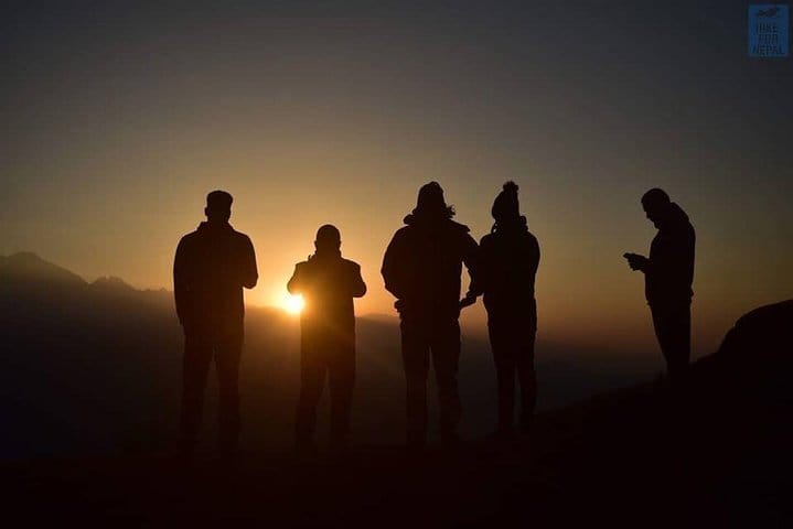 The sun goes down as the clock hits 5pm in the evening, on the outskirts of Kathmandu, Nepal.