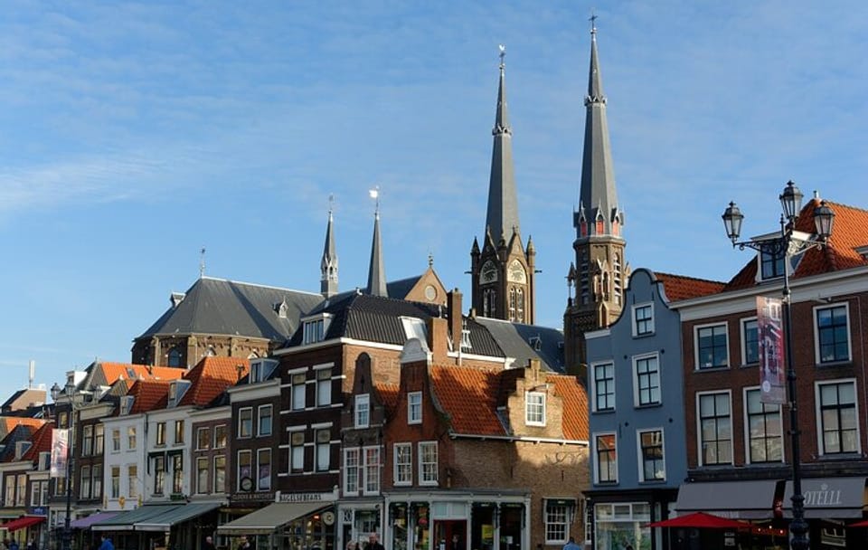 Explore Delft's Historic Streets and Market Square on Foot