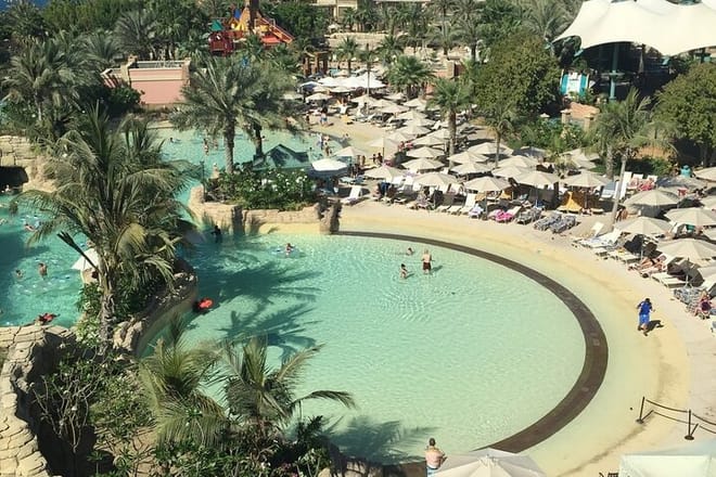 Experience the thrill of Aquaventure slides and the wonder of Lost Chambers Aquarium in Dubai."