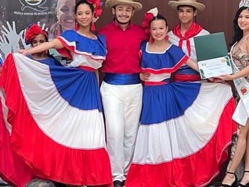 Participants in Dominican folk costumes in Santo Domingo