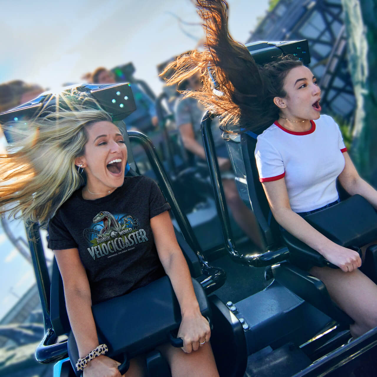 Guests riding Jurassic World VelociCoaster at Universal Islands of Adventure
