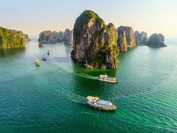 Ha Long Bay Full Day Tour : Kayak,Cave Explore,Swimming from Tuan Chau Island