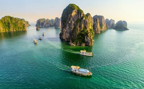 Ha Long Bay Full Day Tour : Kayak,Cave Explore,Swimming from Tuan Chau Island