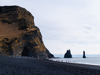 Black sand, basalt cliffs and ocean views are here at Reynisfjara. Just do not get close to the water!
