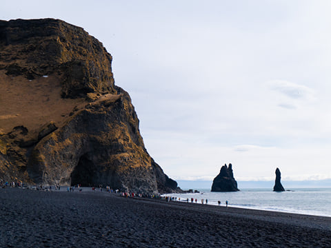 Black sand, basalt cliffs and ocean views are here at Reynisfjara. Just do not get close to the water!