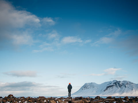 A man observes the awesome landscapes on Snæfellsnes Peninsula