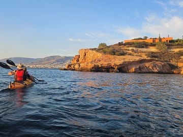 Sunset Kayaking Adventure along Vouliagmeni Coastline