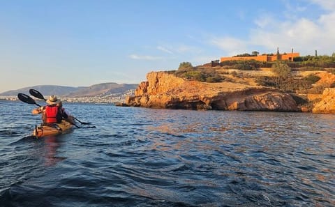 Sunset Kayaking Adventure along Vouliagmeni Coastline
