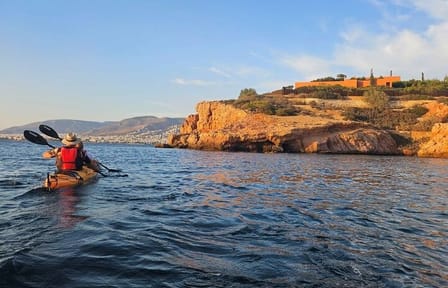 Sunset Kayaking Adventure along Vouliagmeni Coastline