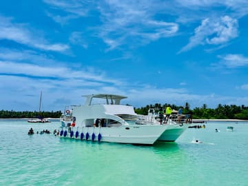 Catamaran Fiesta: Snorkel, Swim-Up Bar & Open-Air DJ Party