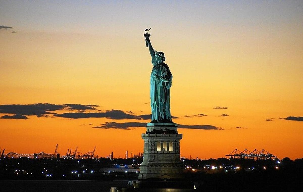 Sunset Skyline Cruise Near Statue of Liberty in New York