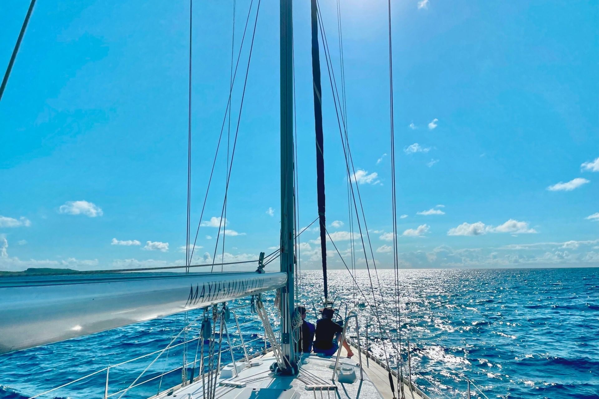 Romantic couple enjoying private morning cruise in Curacao with Maxie Sailing