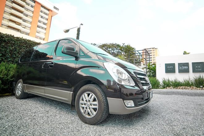 Private Transportation Service Within Guatemala City on a Minibus with A/C 3