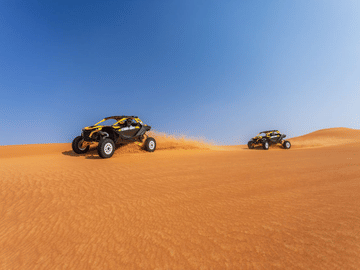 Desert Buggy Adventure with Camel Ride and Sandboarding in Sharjah