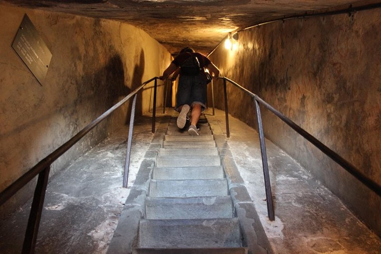 View of a customer climbing the narrow steps of the Dome staircase