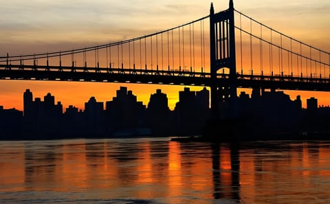 Sunset Skyline Cruise Near Statue of Liberty in New York