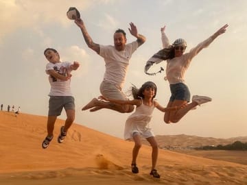 Desert Safari Dune Bashing Camel Ride Sandboard BBQ Dinner