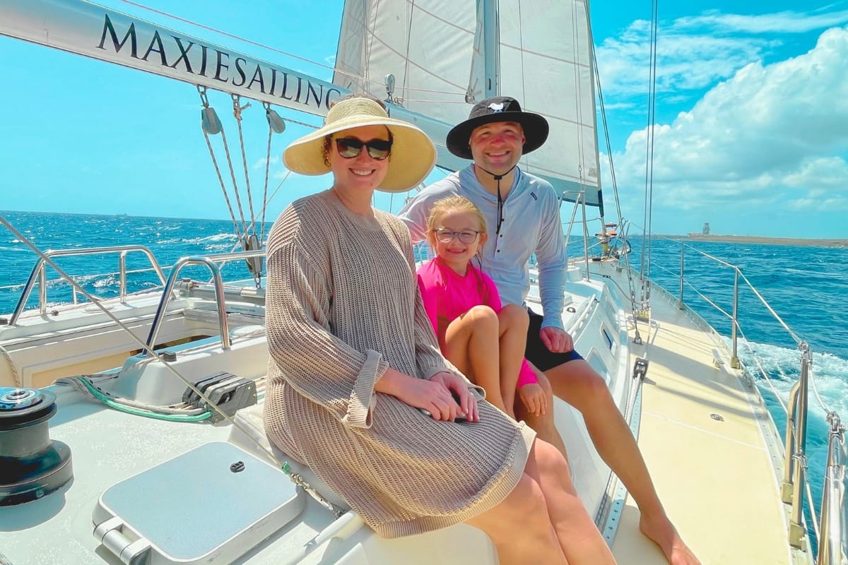 Family enjoying sailing Caribbean Sea during a lunch tour by Maxie Sailing in Curacao