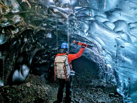 Photographer in the Sparkle Ice cave